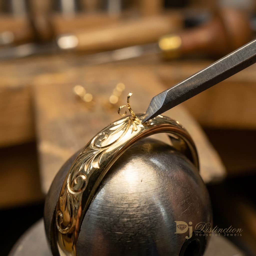 Hand engraving a message inside a gold wedding band